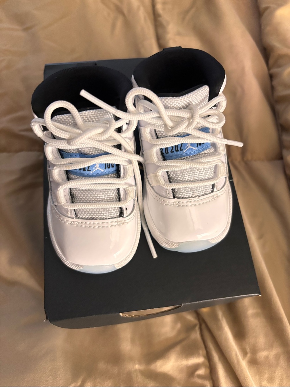 Jordan Kids 11s White and Light Blue Retro Sneakers